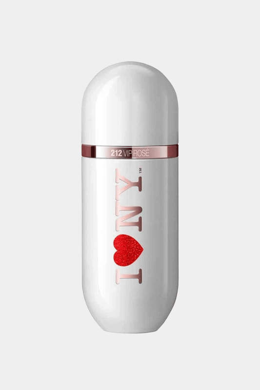 Carolina Herrera's 212 VIP Rose perfume features a white, rounded bottle with a rose gold band and "I ? NY" design filled with sparkly red glitter. The sleek, sophisticated design combines elegance with playful femininity, set against a simple white background.