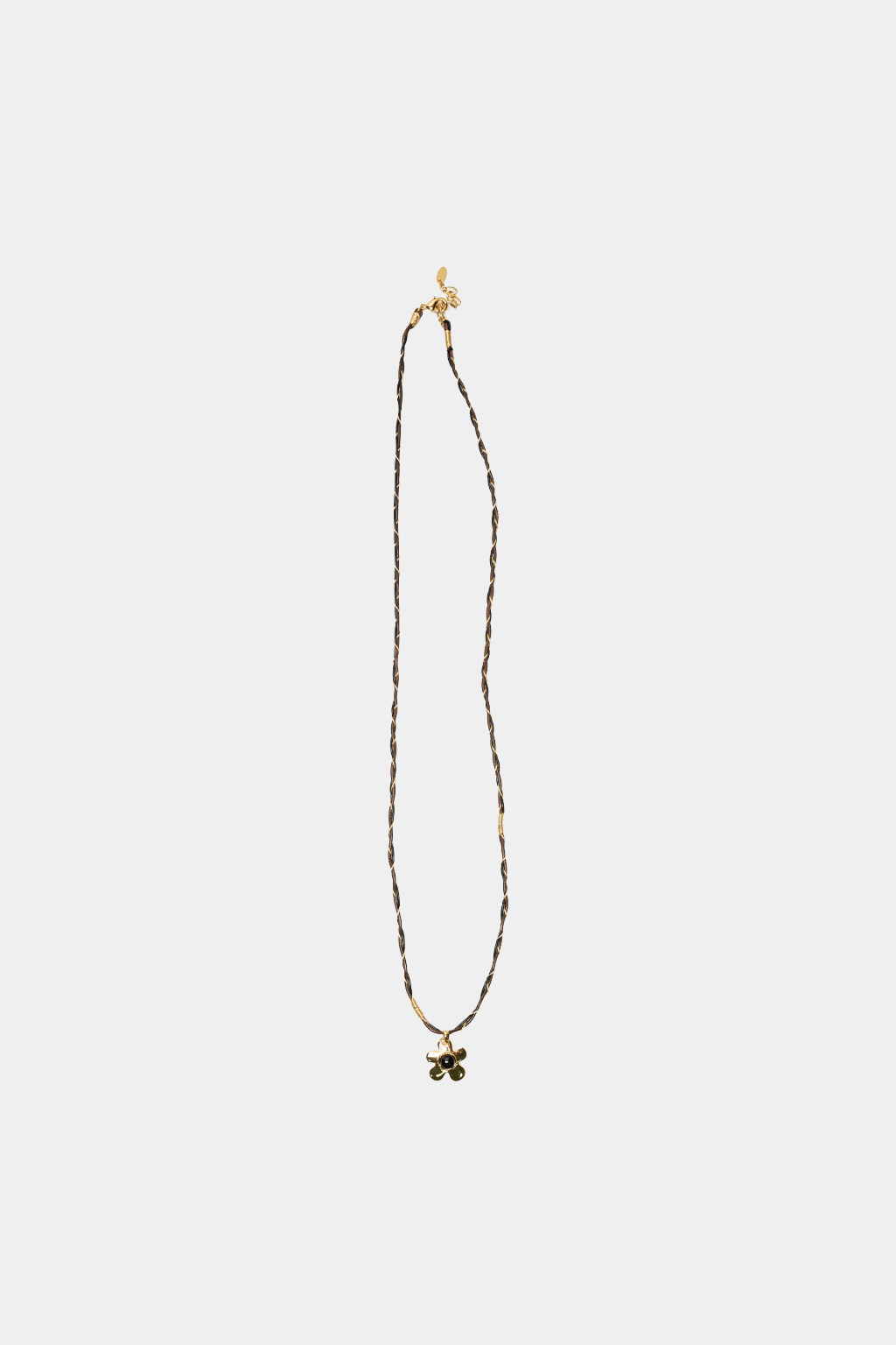 Dikochi - Gold-Tone Flower Pendant Necklace with a Black Center Stone