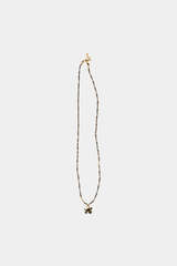 Dikochi - Gold-Tone Flower Pendant Necklace with a Black Center Stone